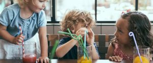 Three children laughing