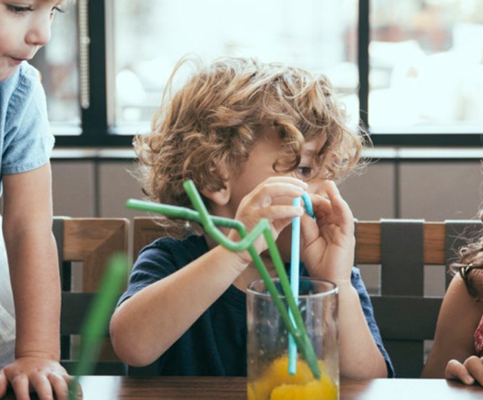 Three children laughing