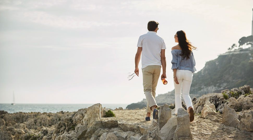 Couple on the coast of St. Jean Cap Ferrat in the French Riviera