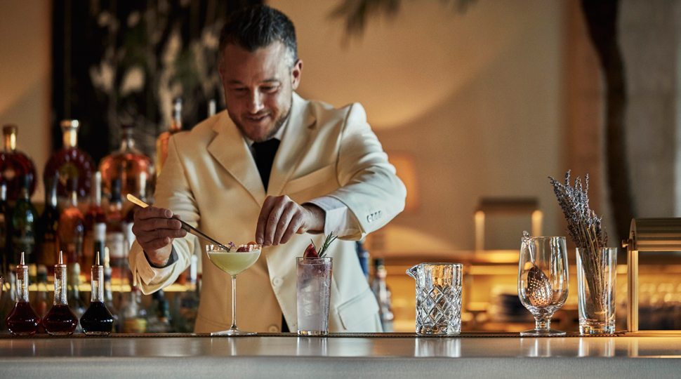 A bartender at Four Seasons Surf Club Resort