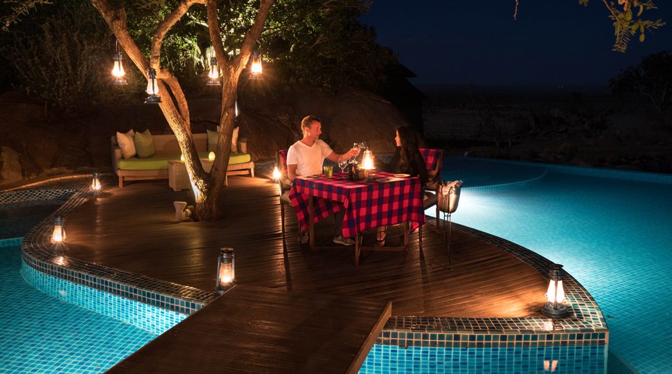 Bloggers Marcy Yu and Robert Michael Pool enjoy a private dinner at the Four Seasons Serengeti