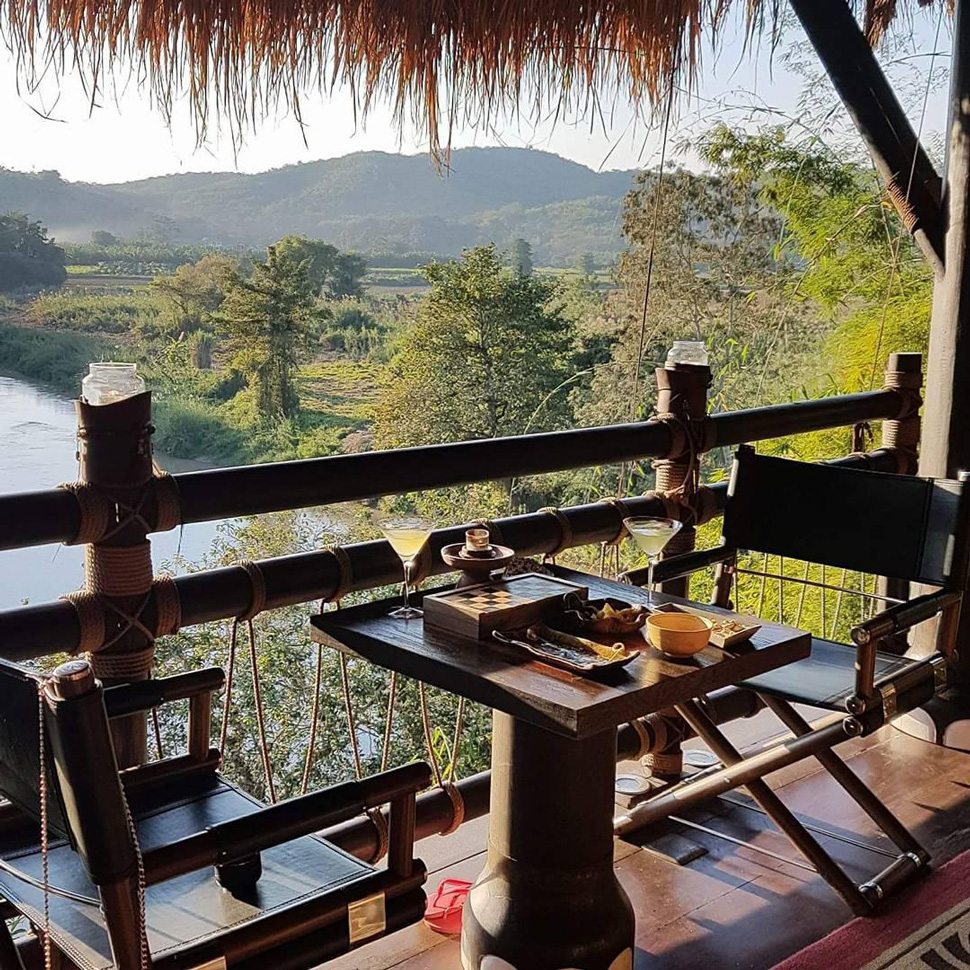 Golden Triangle outdoor restaurant seating with cocktails