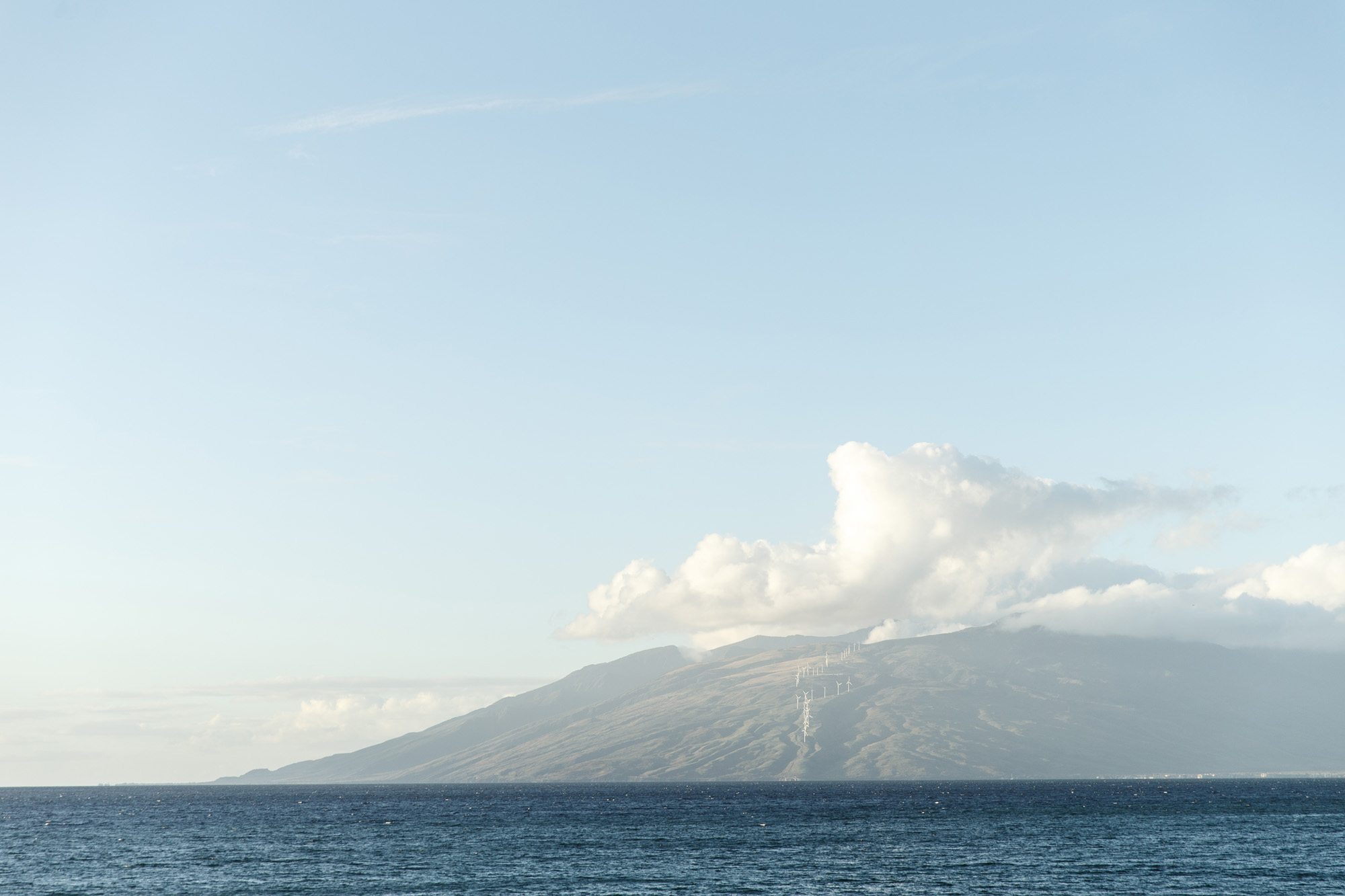 Maui large clouds over island and ocean