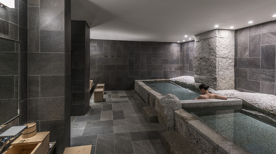 Woman lounging in a spa pool