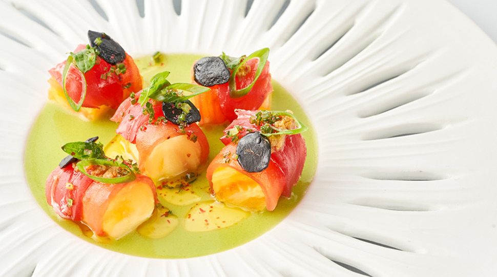 A seafood dish on a white plate
