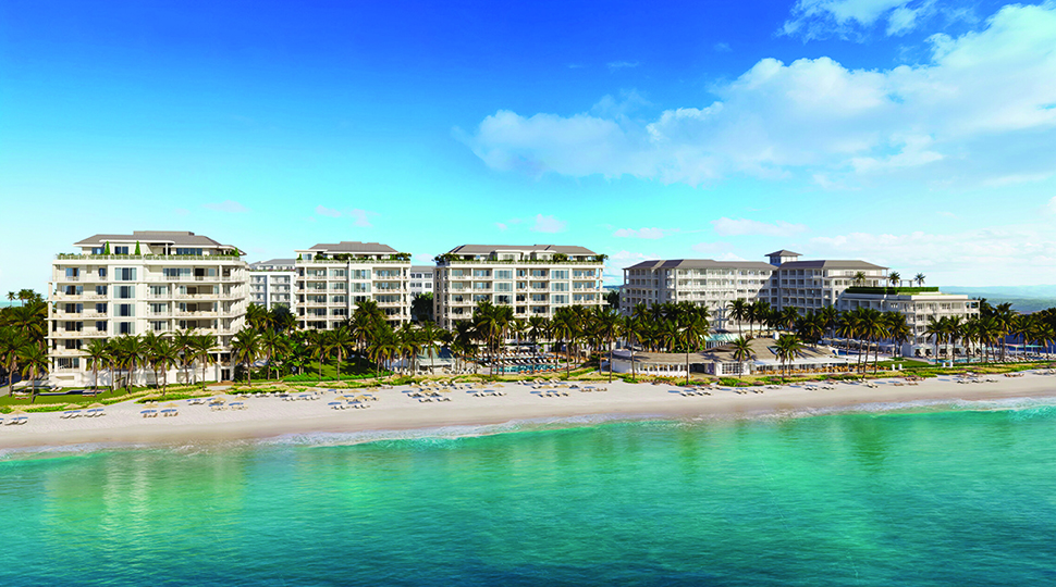 Five buildings set along the shoreline