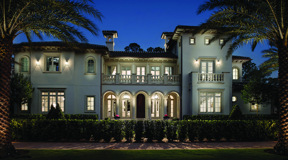 Exterior of Spanish-style house at night
