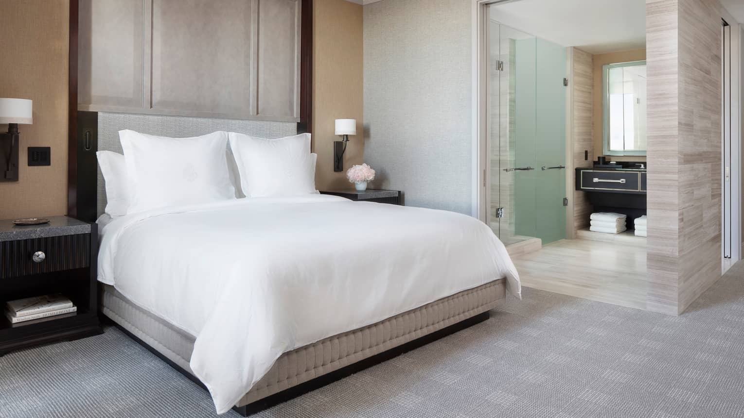 guest room with a queen size bed at four seasons hotel boston one dalton 