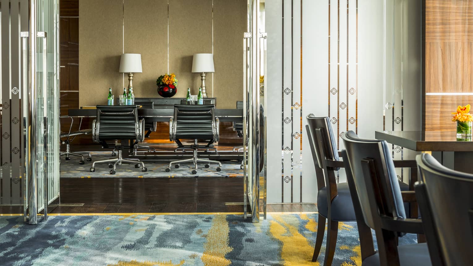 Executive Club Lounge boardroom, leather chairs on wheels around meeting tables