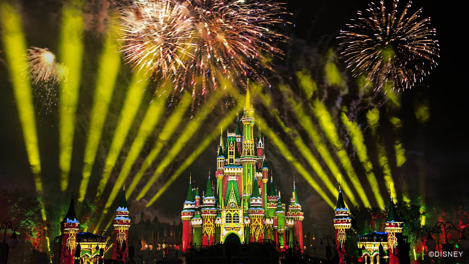 A festive fireworks show at Cinderella's Castle at Disney World