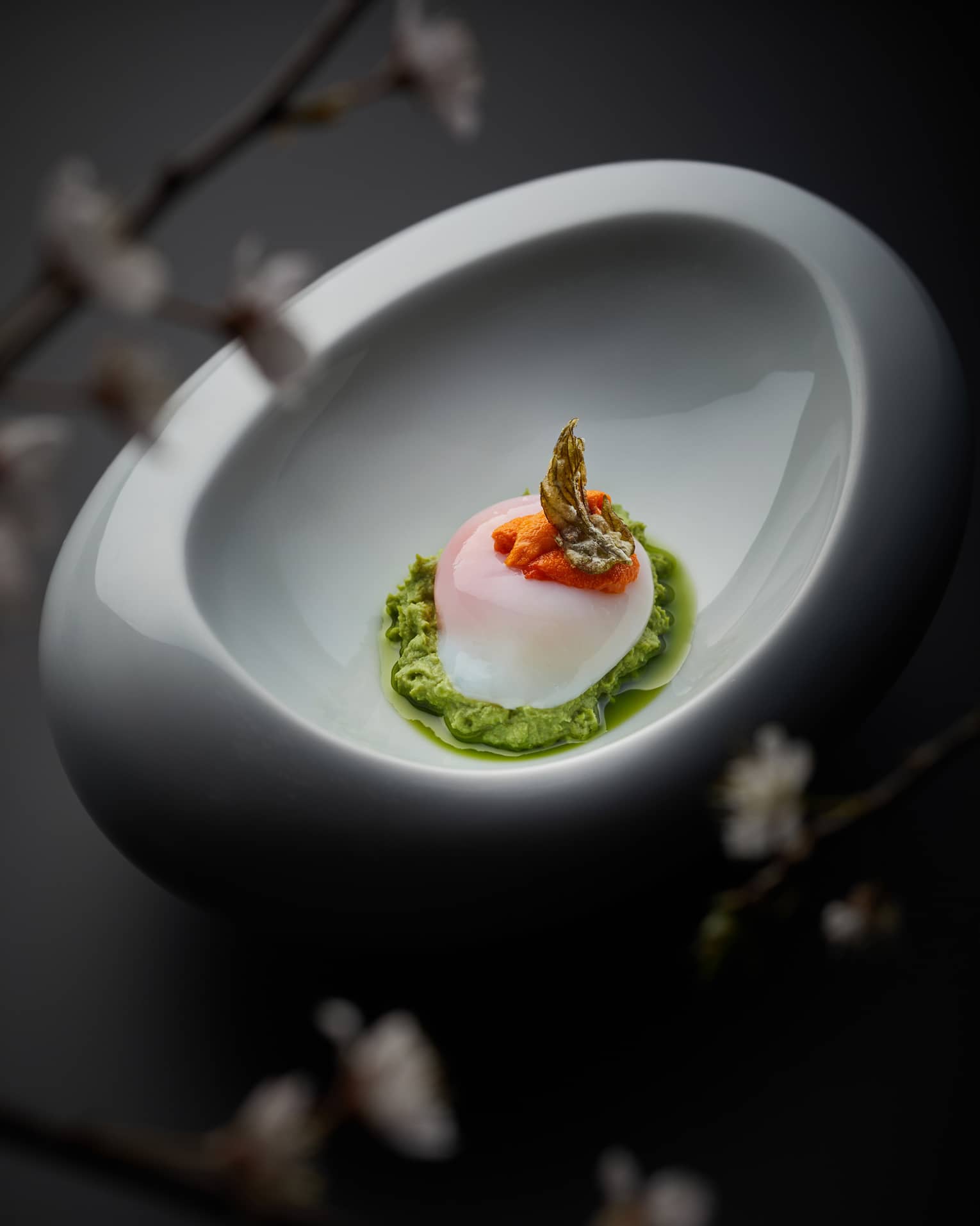 Signature dish with broad bean, egg and sea urchin by multi-award-winning Four Seasons chef