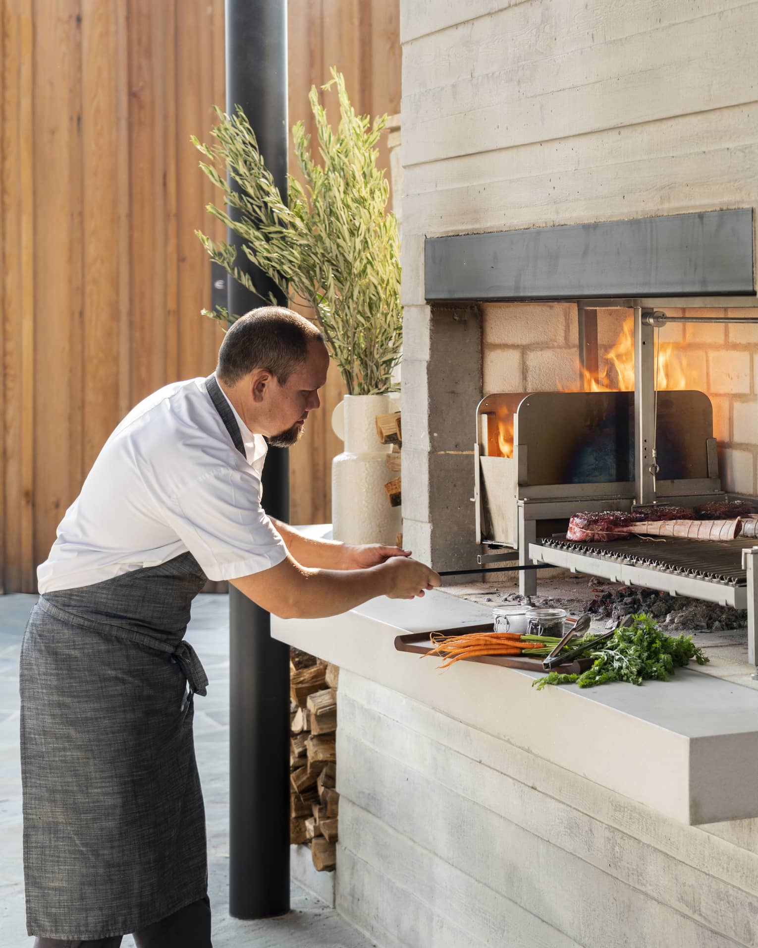 A chef cooking outside.