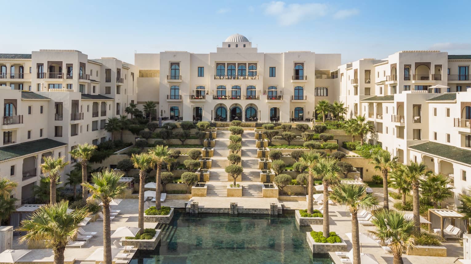 The regionally-inspired hotel facade and staircase
