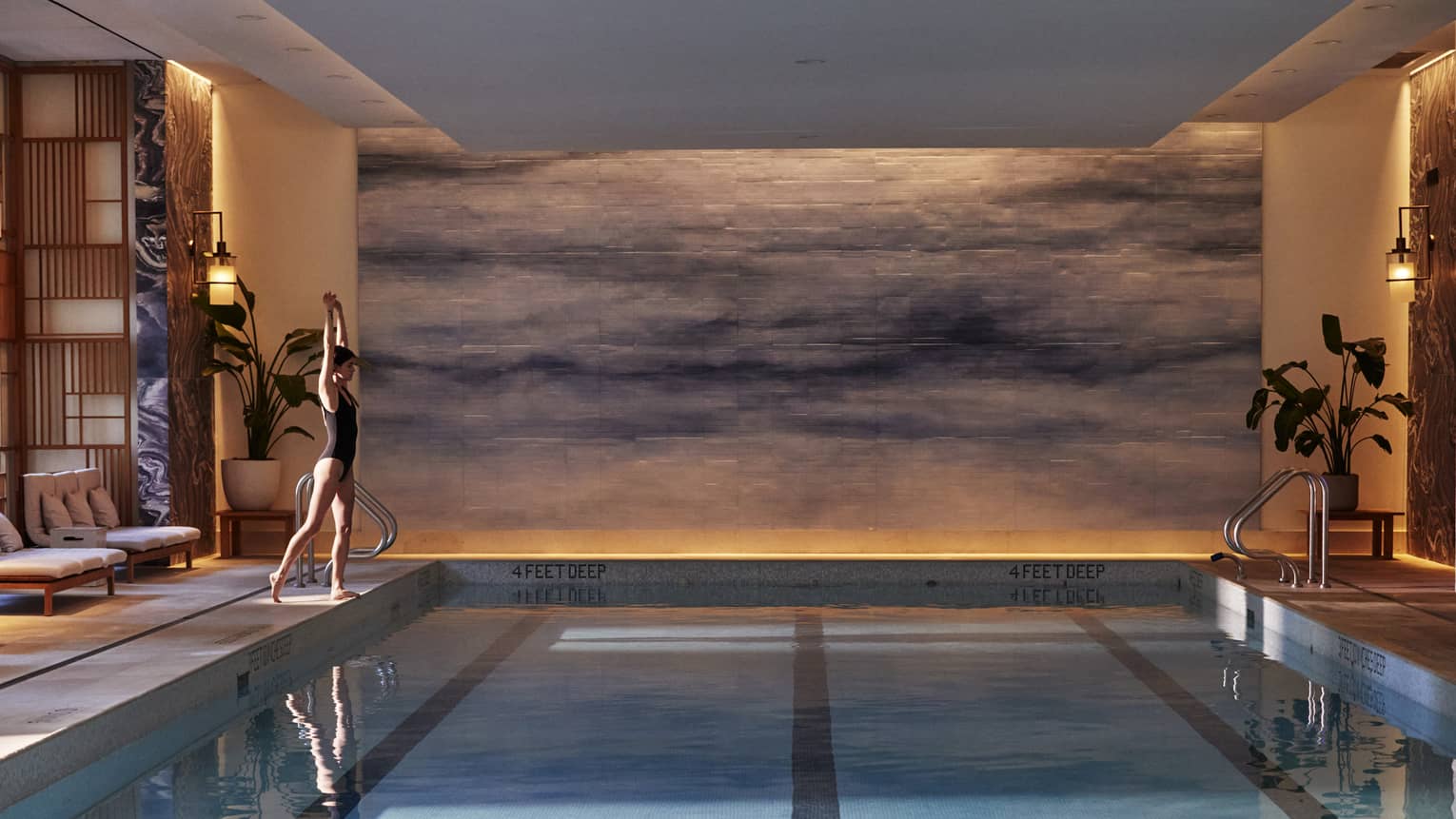 Guest getting ready to dive into the pool.