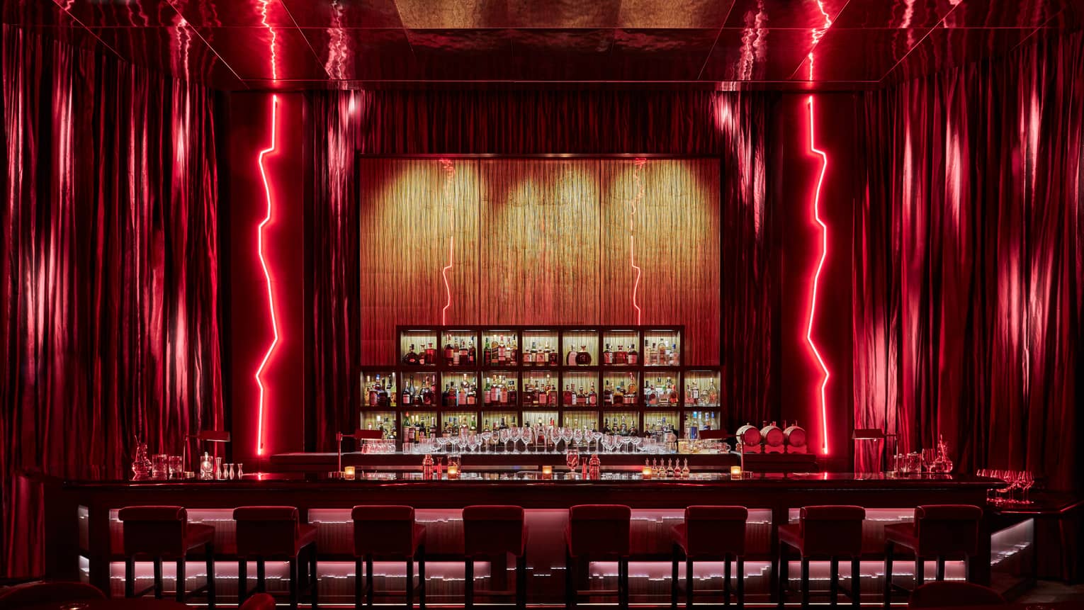 Bar table with red lights in the background.