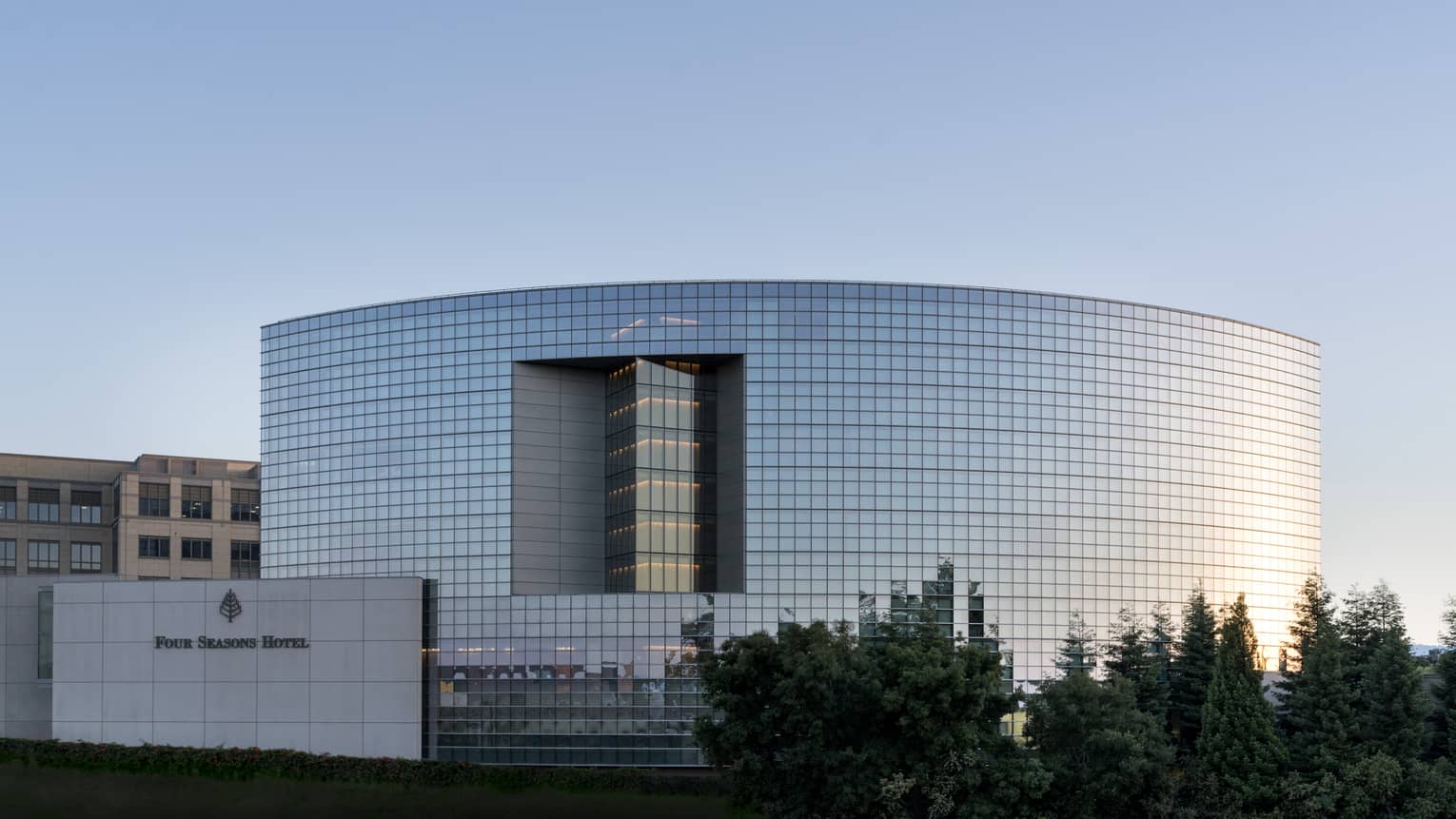 Modern, round exterior of Four Seasons Silicon Valley at East Palo Alto during day