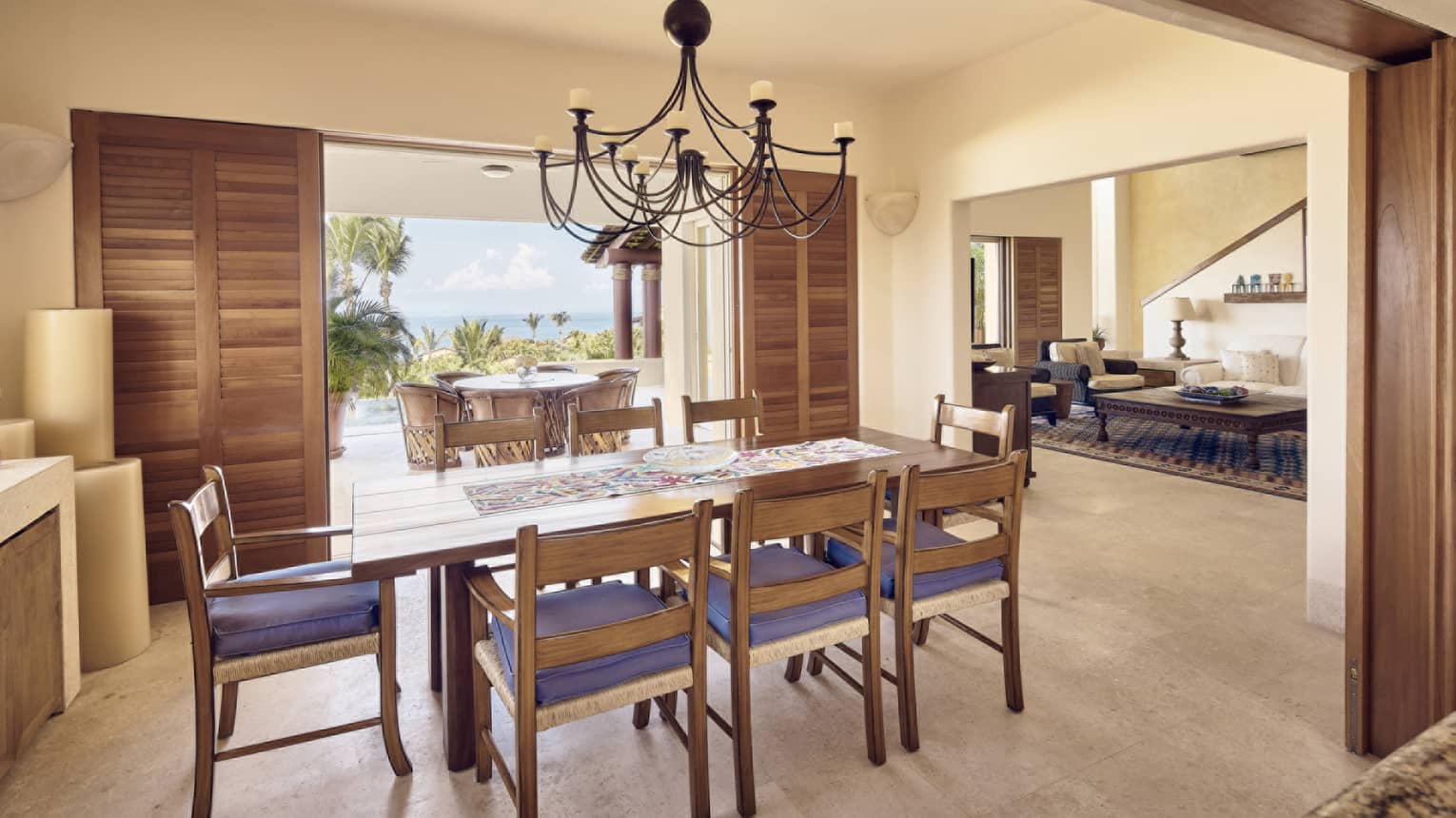 Dining room with wooden table and chairs for eight
