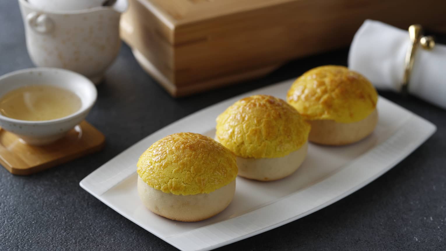 Three cornbread muffins 