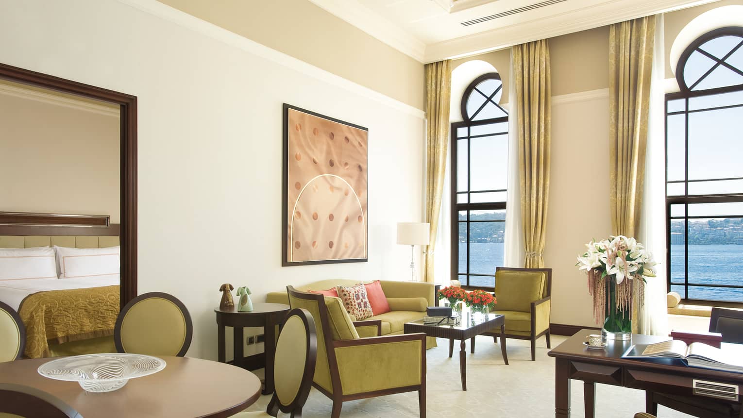 Bosphorus Palace Suite seating area, small round dining table in front of bay windows
