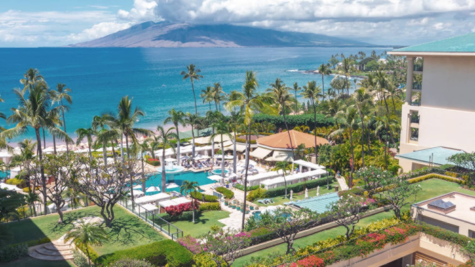 View from a balcony at Maui resort, with view of ocean and resort grounds