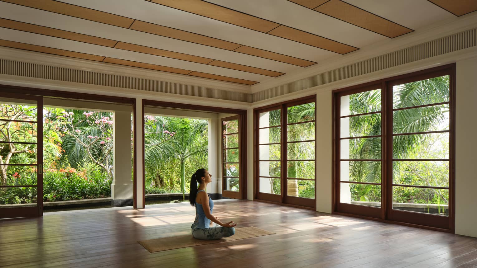 Woman sitting in a meditative pose
