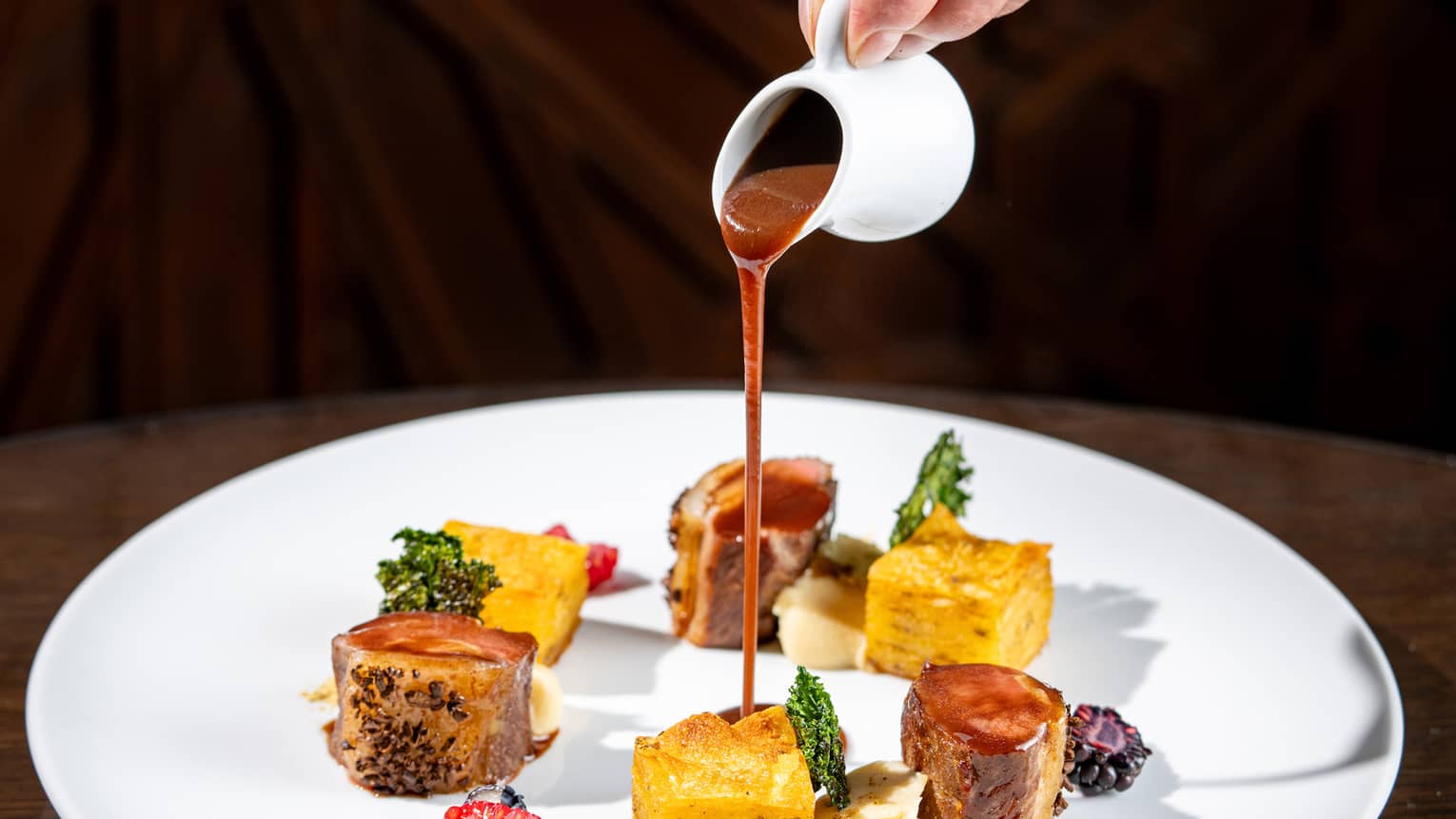 Lamb in Coffee Crust, Celeriac and Licorice Mille-Feuille Potato, Wild Berry Sauce