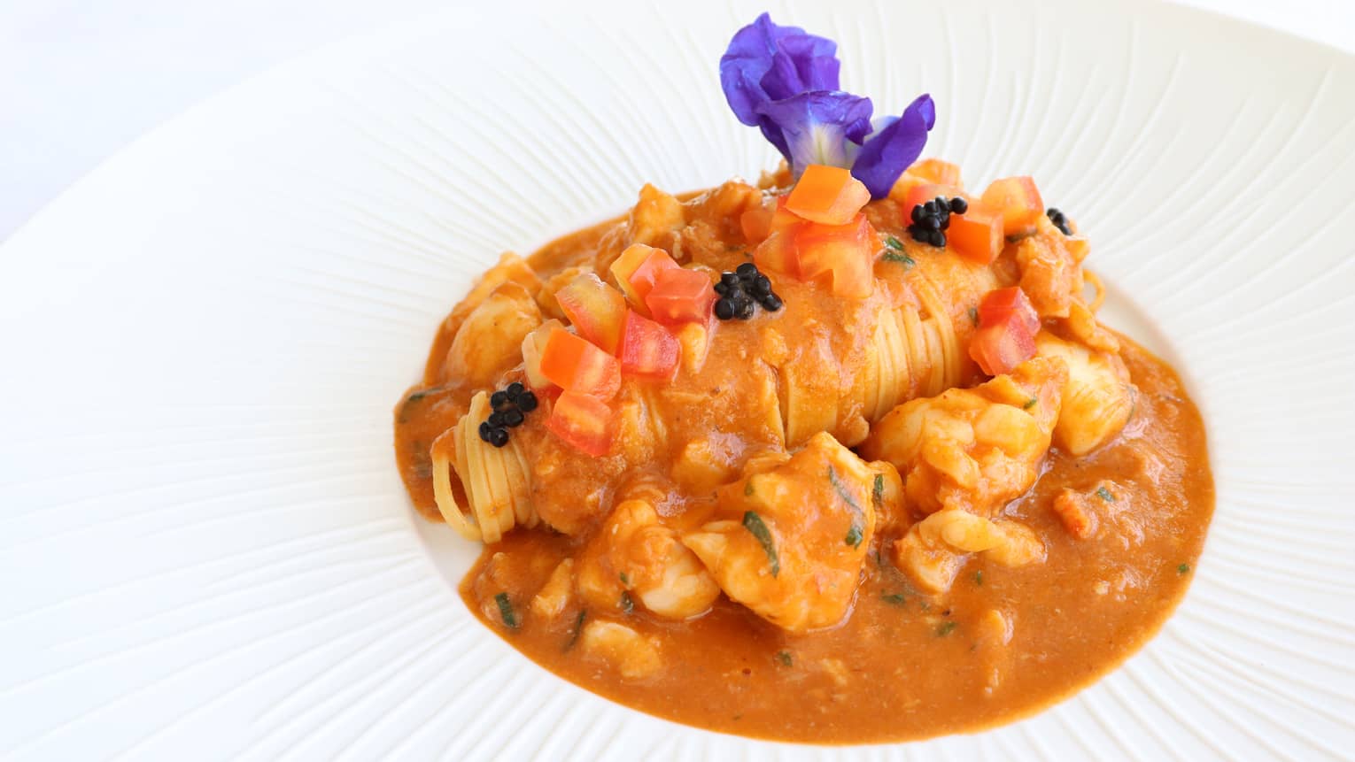 Tagliolini with Lobster, Vanilla Bisque, Tomato and Herring Caviar