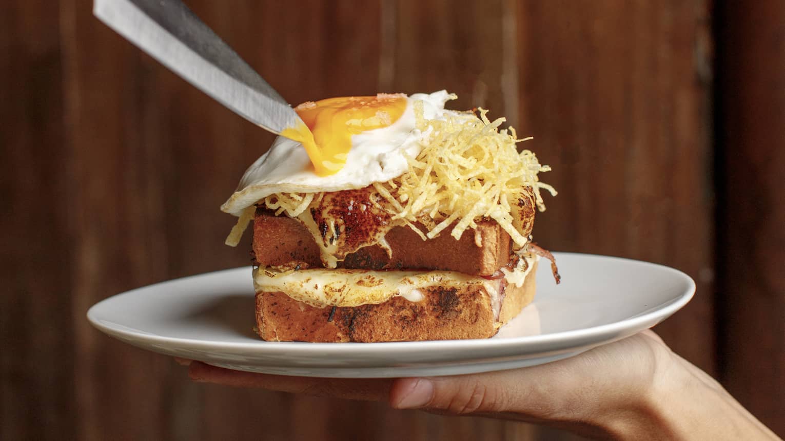 An egg and cheese on bread.