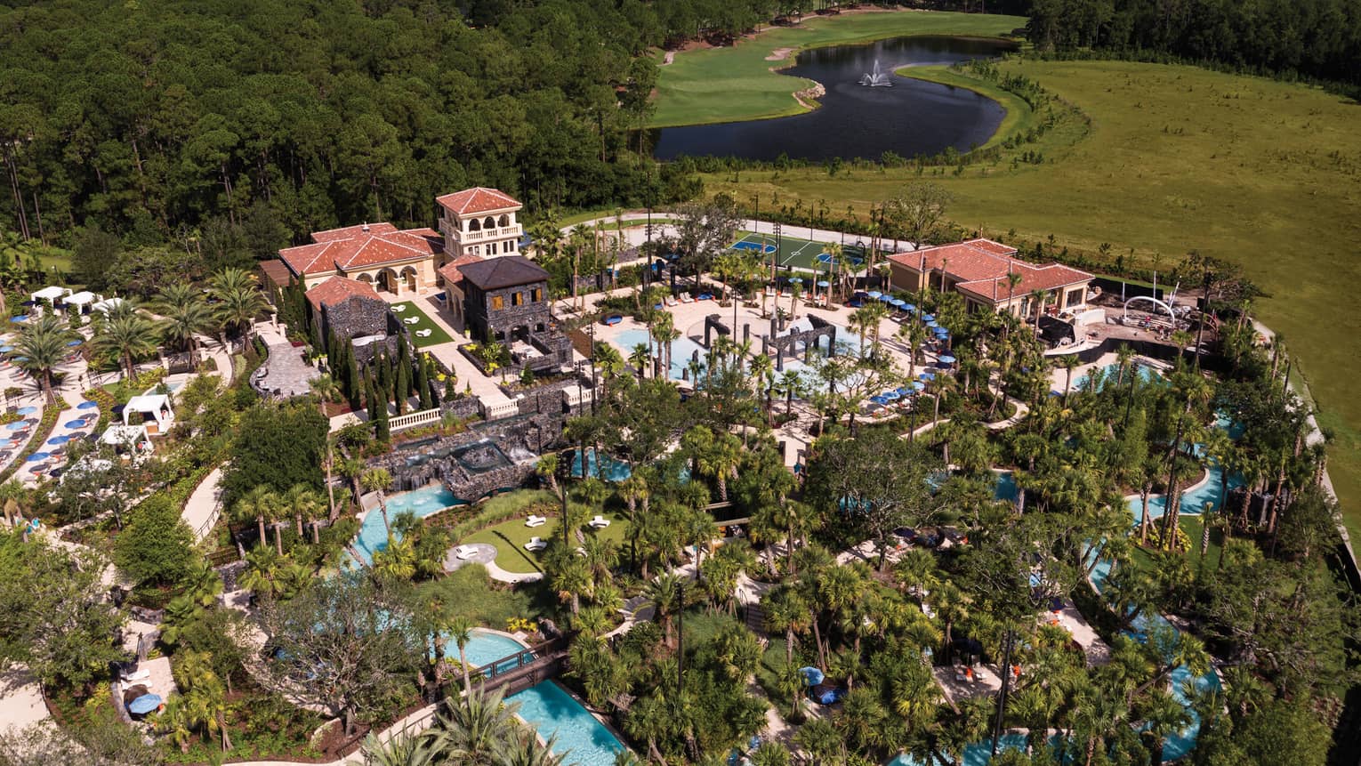 Aerial view of Four Seasons Orlando at Walt Disney World Resort buildings, gardens, pools