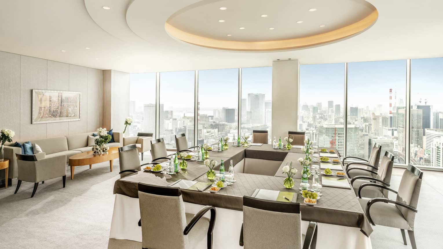 Executive Dining Room with hollow square table, floor-to-ceiling windows with city views