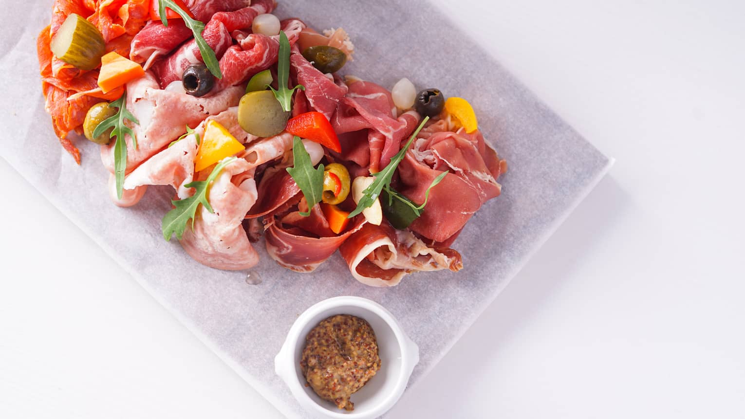 Assorted Italian Cold Cuts Gherkins, Pickled Onions, Mustard, Giardiniera