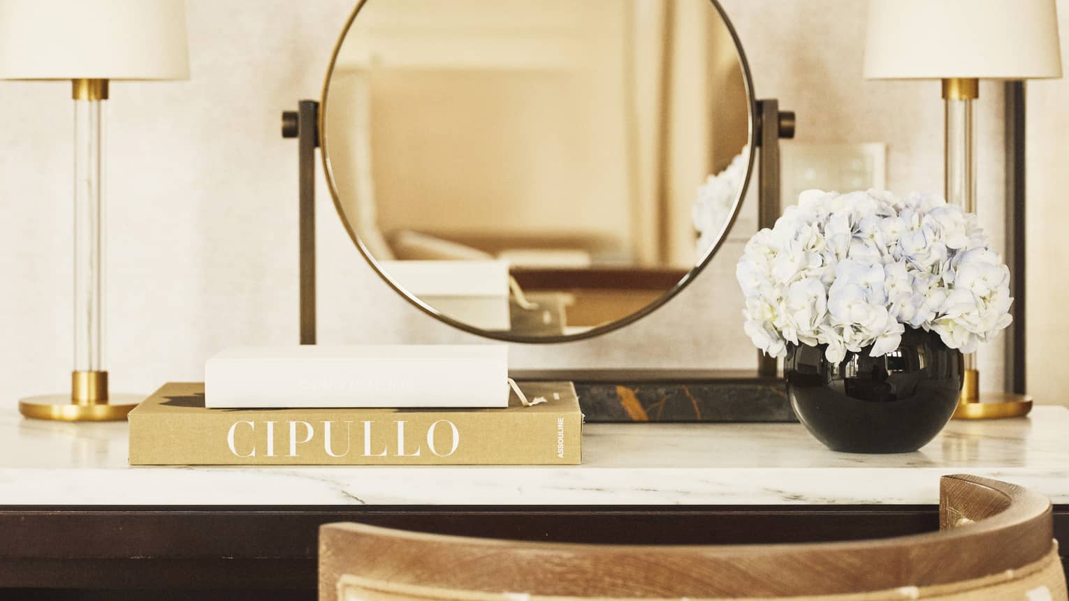 A stylish makeup vanity in a hotel suite