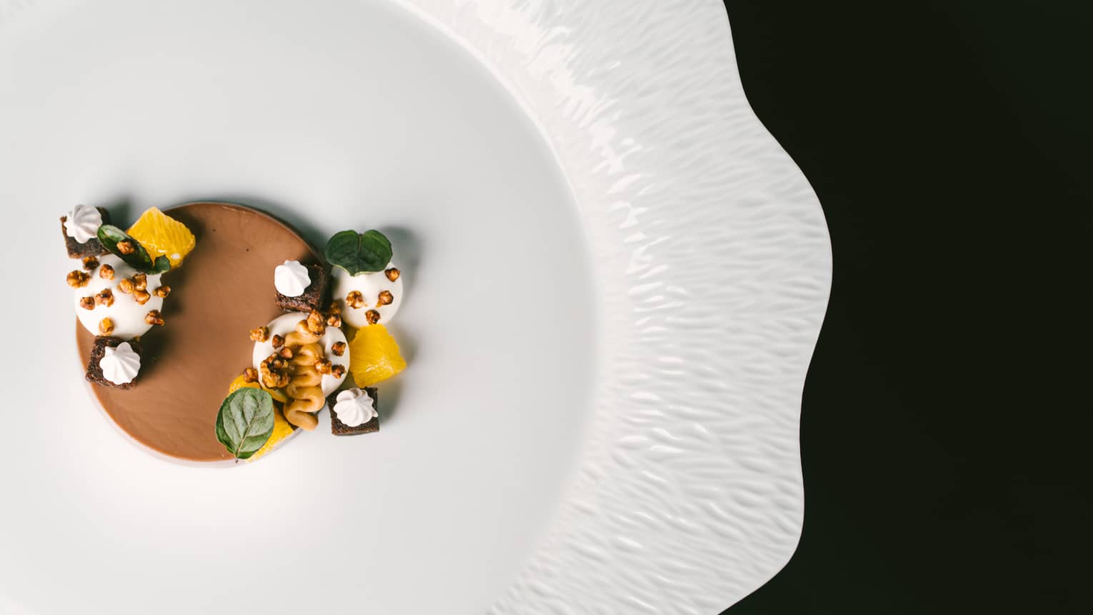 Detail photo of a plate of food prepared in Auro restaurant