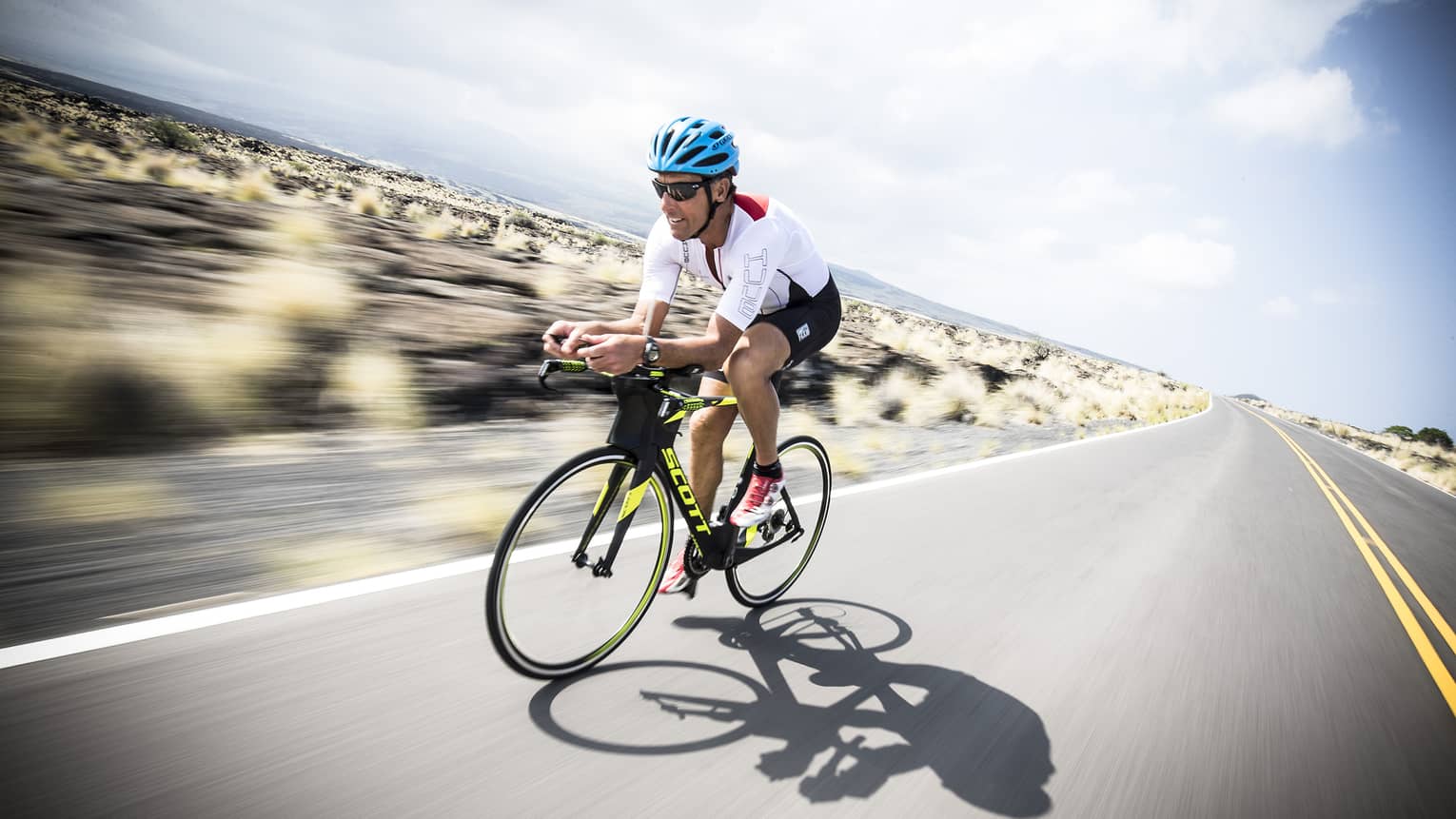 Dave Scott Triathlon camp biker on a Hualalai road