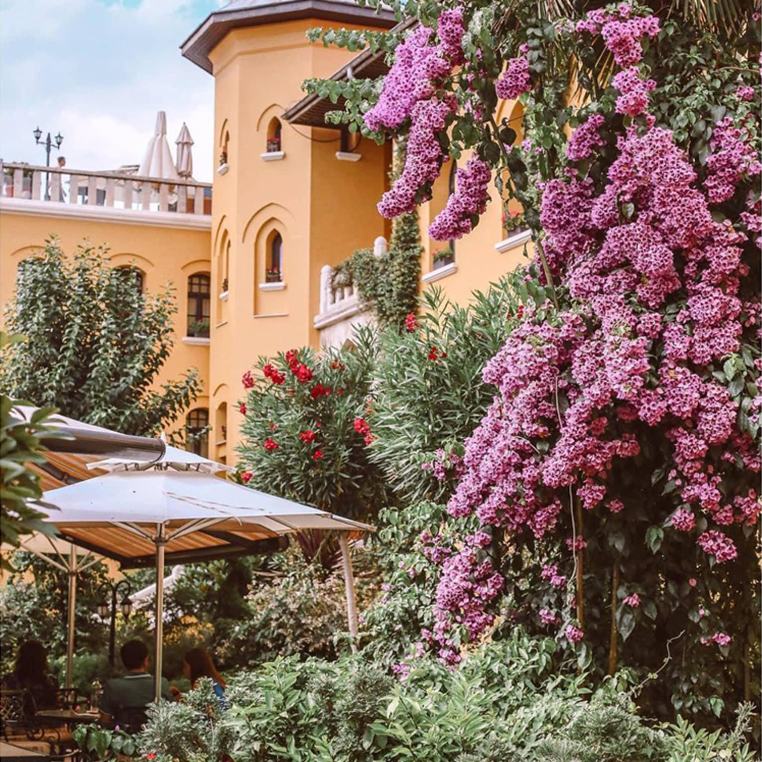 Four Seasons Instanbul at Sultanahmet patio garden under building with turret