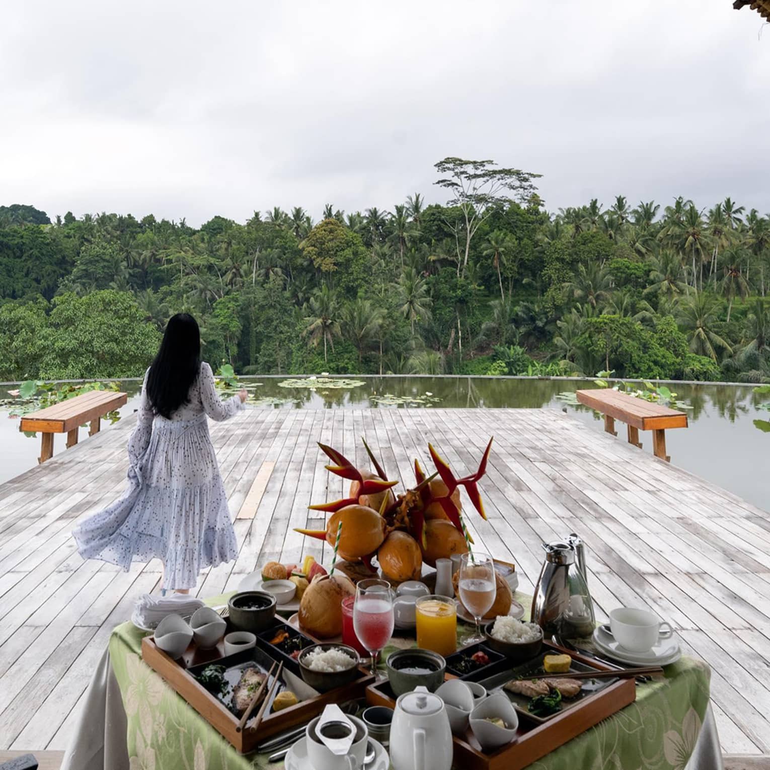 Woman on decking overlooking Ayung River Valley
