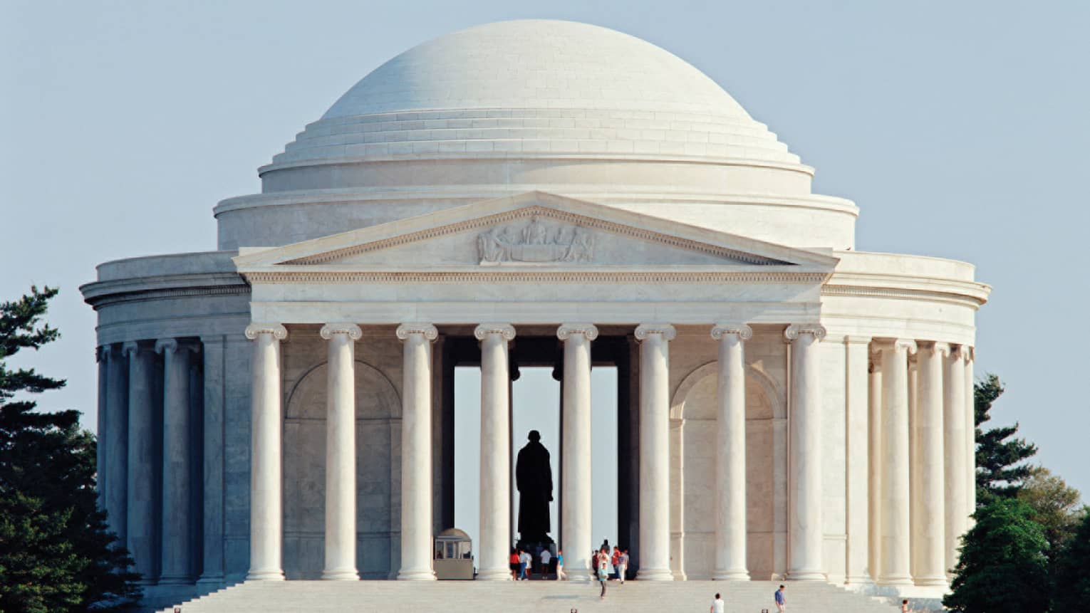 Thomas Jefferson Memorial, people are walking along the stairs.