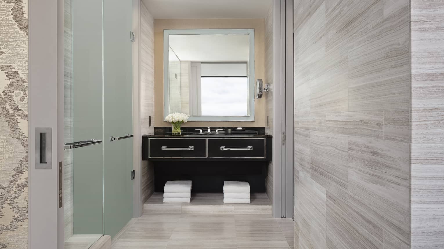 A neutral bathroom at four seasons hotel boston one dalton