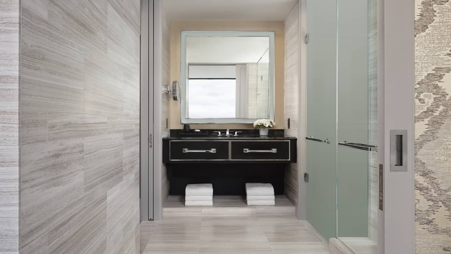 a neutral bathroom adjacent to a suite at four seasons hotel boston one dalton