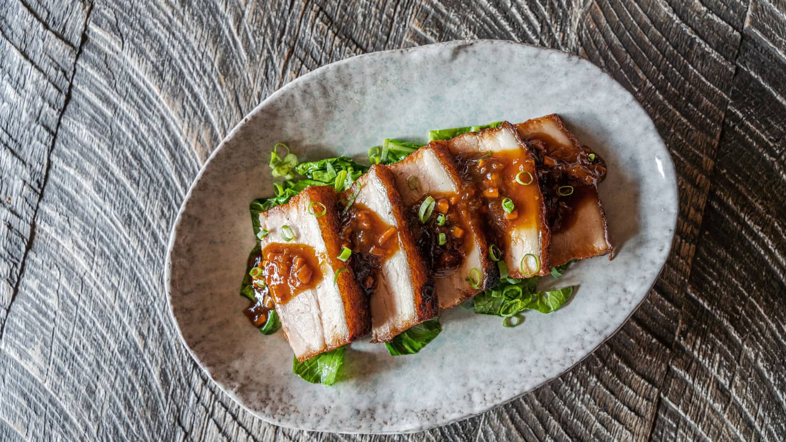 Thit Heo Quay ? Crispy Pork with Bok Choy, Coriander and Black Spicy Sauce