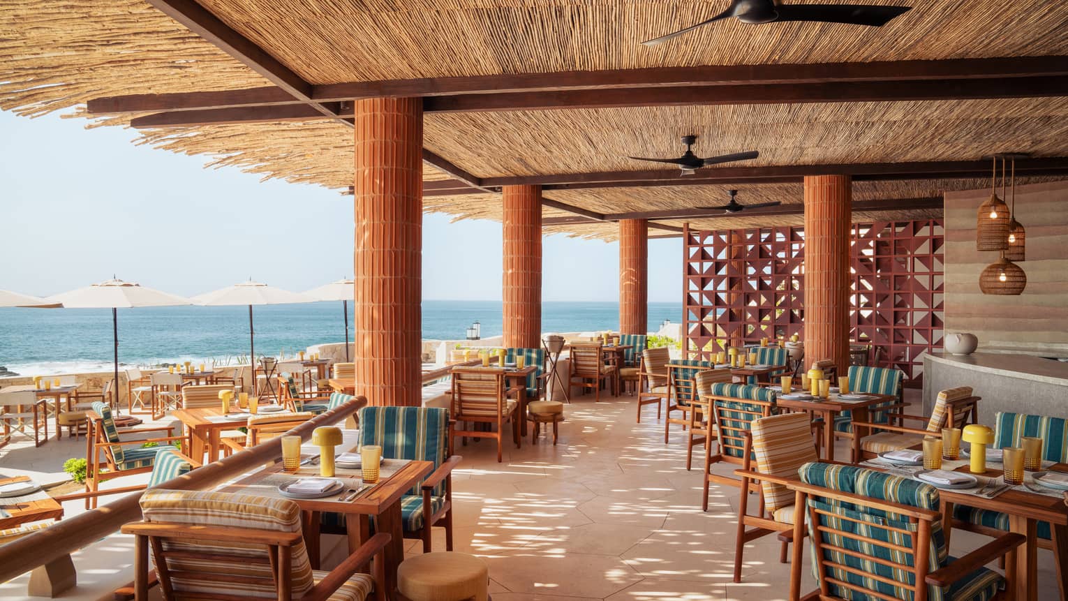 Outdoor restaurant terrace with ocean view at Cabo San Lucas