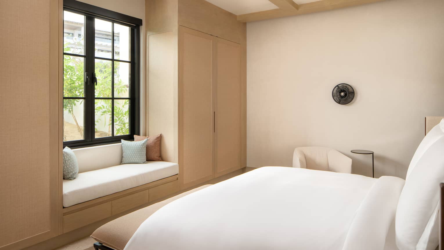 Bedroom with king bed and window seat