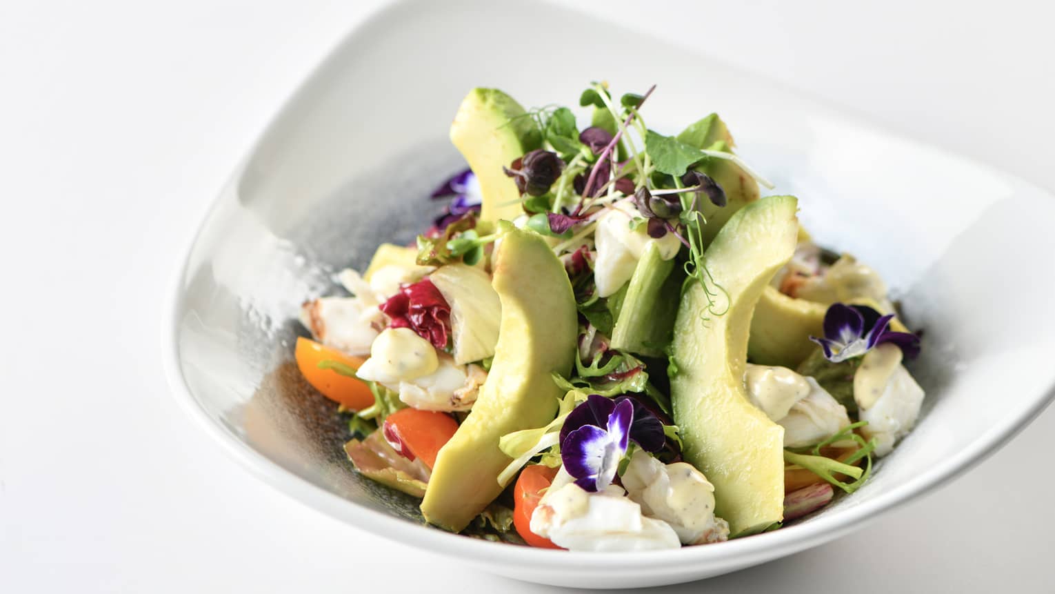 Avocado Crab Salad with Mesclun Leaves, Heirloom Cherry Tomatoes, Truffle-Yuzu Dressing