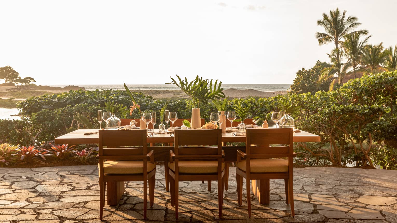 Outdoor dining table for six set near Hawaiian beach
