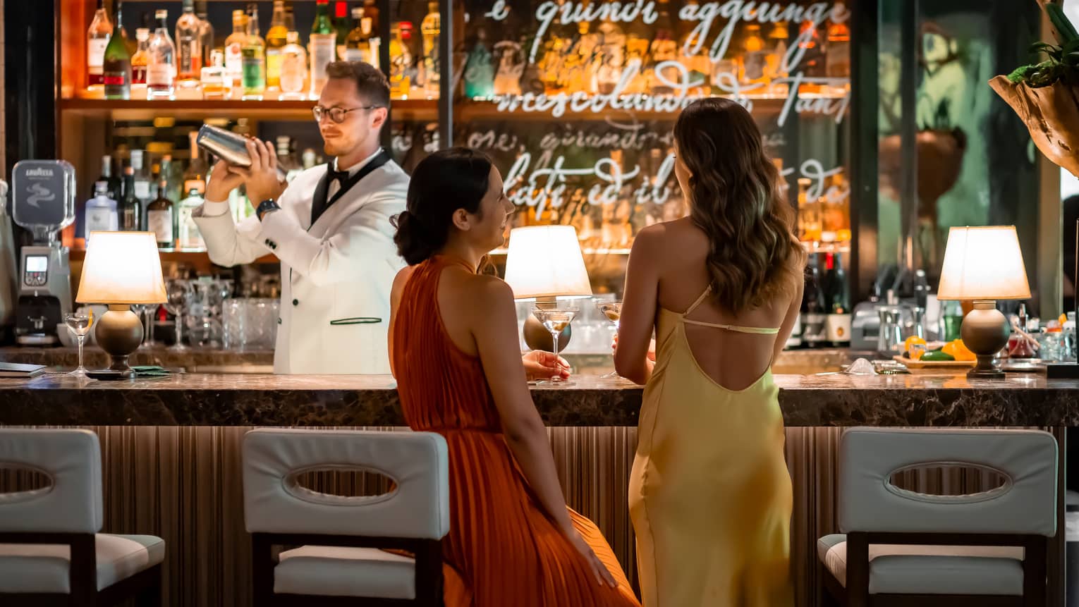 Two women at luxury hotel bar