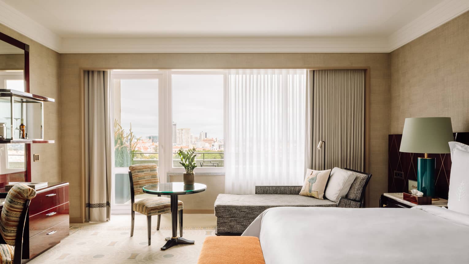 Bedroom with small round table and chair