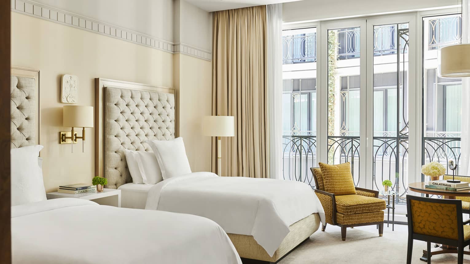 Hotel room with two single beds and Juliet balcony