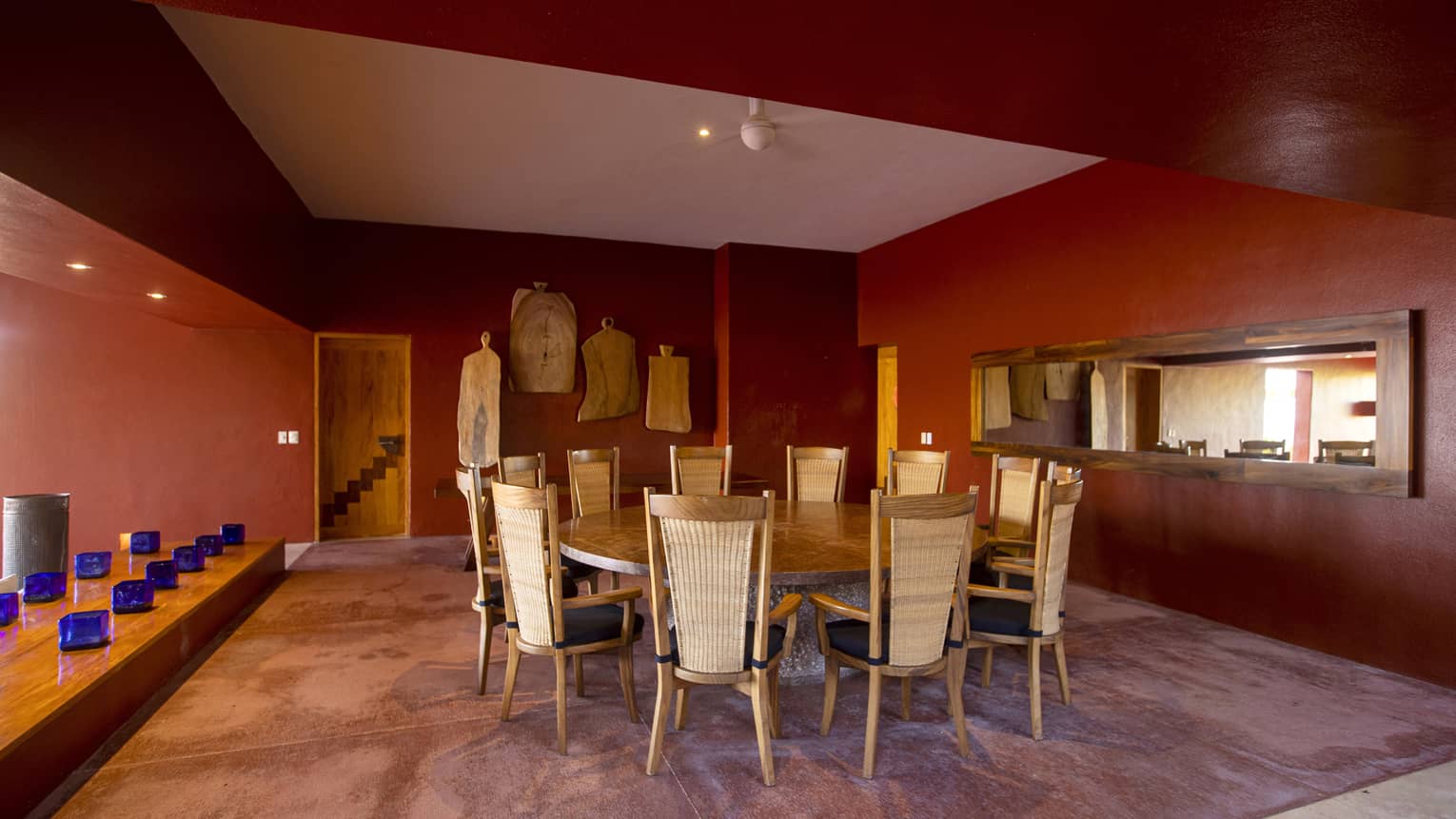 Dining room with large round table and 12 chairs