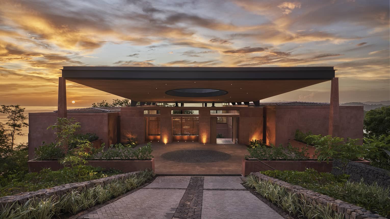 Illuminated outdoor covered terrace at sunset