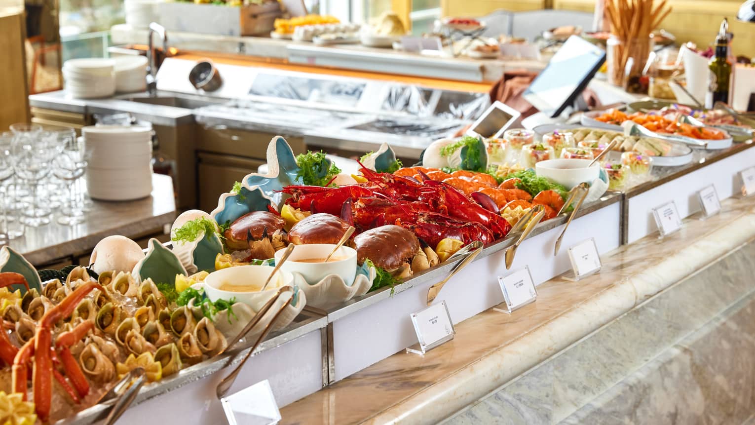 Elaborate lunch buffet spread in a sun-lit restaurant